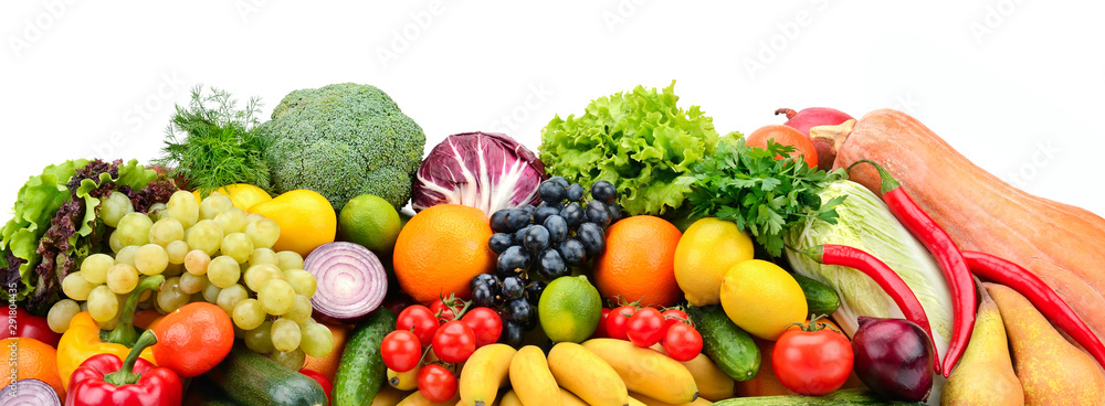 Heap different fruits, vegetables and berries isolated on white