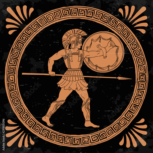 Ancient Greek warrior with a spear and shield in his hands is ready to attack.