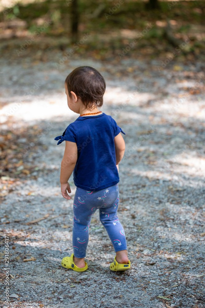 Toddler Girl Exploring Outdoor Hiking Trail Toddler Girl Exploring Outdoor Hiking Trail