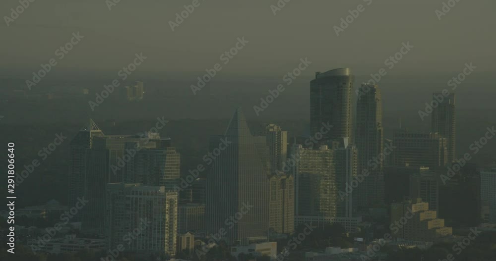Helicopter aerial shot of buildings in downtown Atlanta, sundown Helicopter aerial shot of buildings in downtown Atlanta, sundown