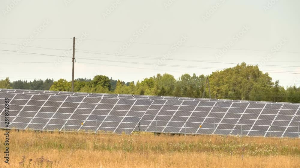 24903_Lots_of_solar_panels_on_the_side_of_the_hayfield.mov 24903_Lots_of_solar_panels_on_the_side_of_the_hayfield.mov