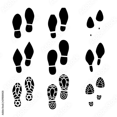 Big set of a imprint soles shoes on a white background.