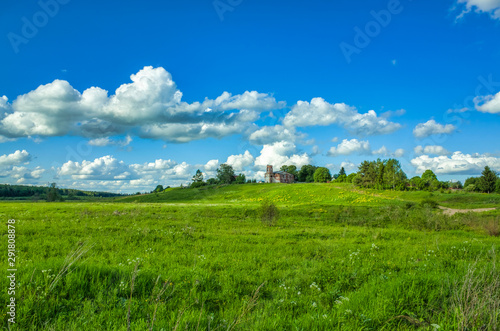 Sunny day, clear sky, meadows and vegetation. Nature in the summer. Aleksino village in the Vladimir region, Russia © KURLIN_CAfE