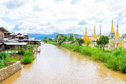 golden pagodas at inle lake, myanmar