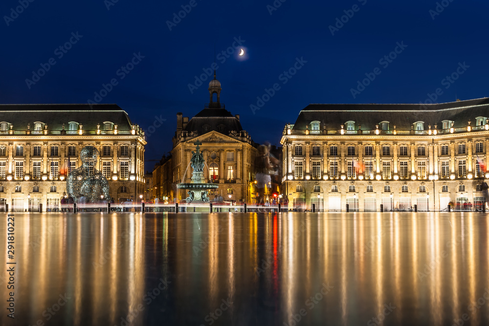 Fototapeta premium Place de la Bourse in the city of Bordeaux, France with reflection from water fountain