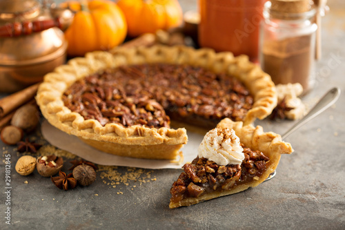 фотографія Pecan pie topped with whipped cream for Thanksgiving