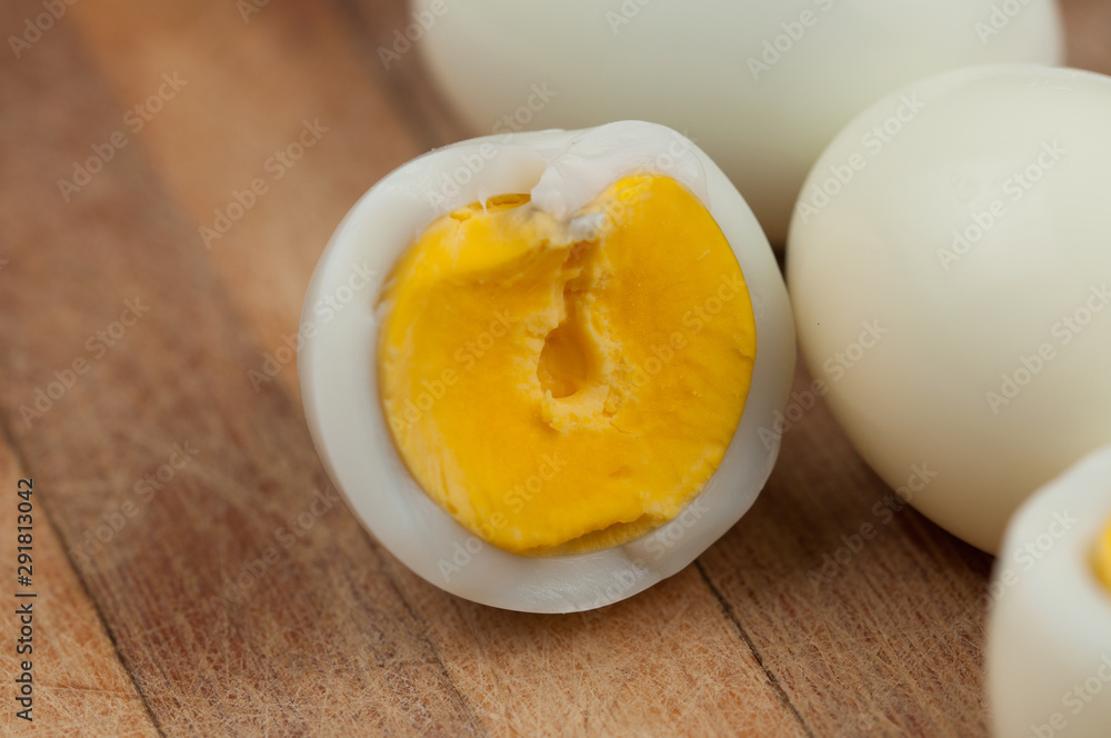 Egg on wooden board isolated on white background Egg on wooden board isolated on white background