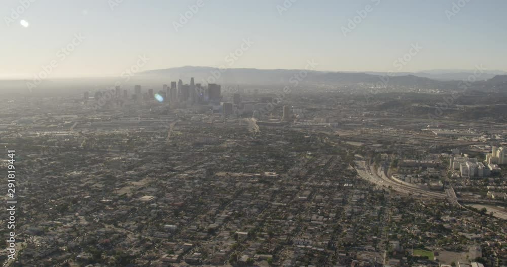 Aerial shot, day, retreating distant view of downtown LA and the city's sprawl, drone Aerial shot, day, retreating distant view of downtown LA and the city's sprawl, drone
