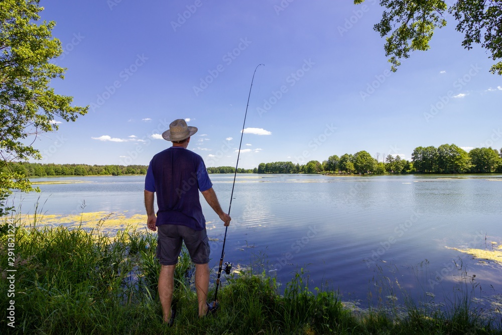 angler during summer clear day angler during summer clear day