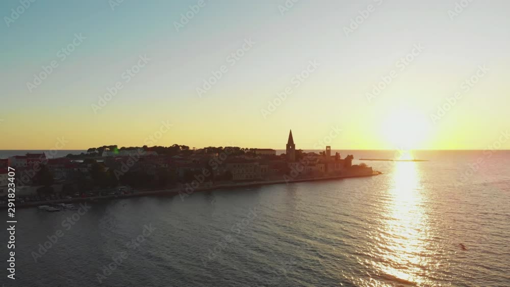 Drone reveal shot old city and island with sea, ocean and seagulls . Sunset with beautiful golden light, 4K Drone reveal shot old city and island with sea, ocean and seagulls . Sunset with beautiful golden light, 4K