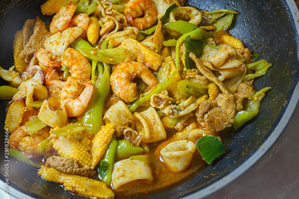 Stir fried Spicy curry with Shrimp, squid and pork. Stir fried Spicy curry with Shrimp, squid and pork.