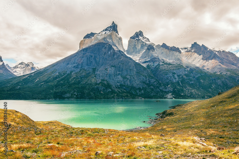 National Park Torres del Paine in southern Chile. Cliffs of Los Cuernos in cold windy autumn day.