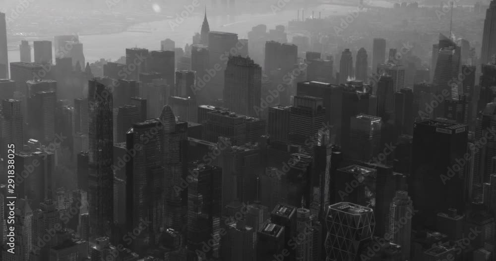Black and white aerial shot, great slow expose of midtown NYC, drone