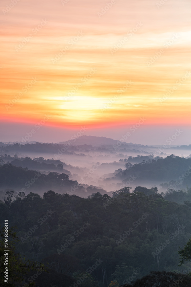 Beautyful sunrise and fog on mountain at thailand