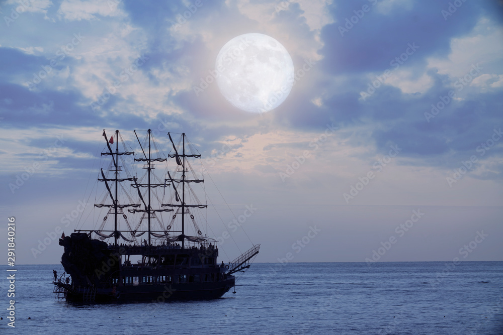old pirate ship sailing, night at sea old pirate ship sailing, night at sea