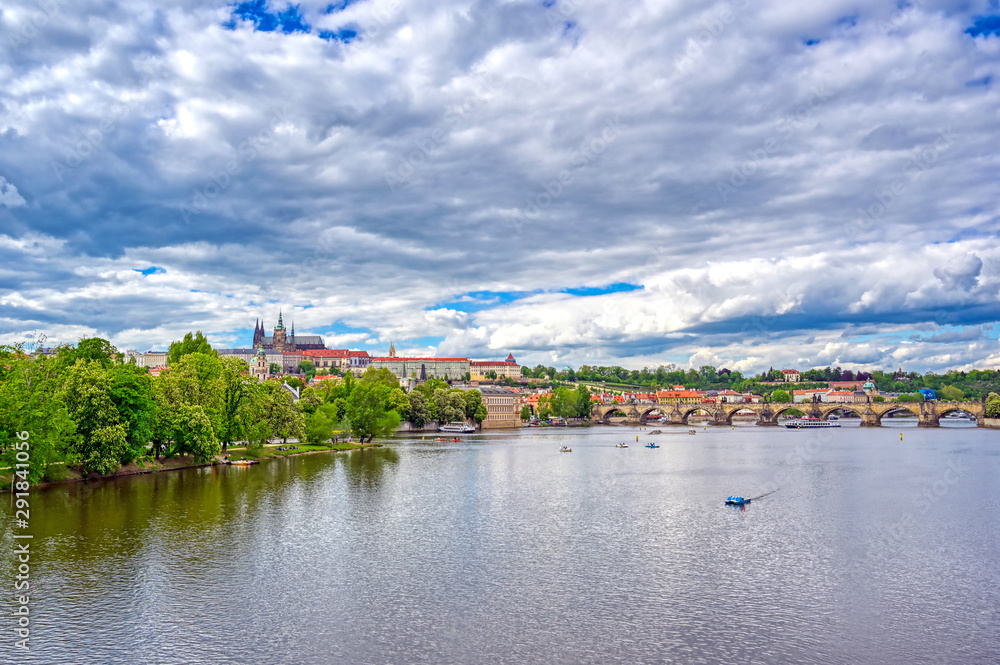 A view of Prague Castle across the Vltava River in Prague, Czech Republic.