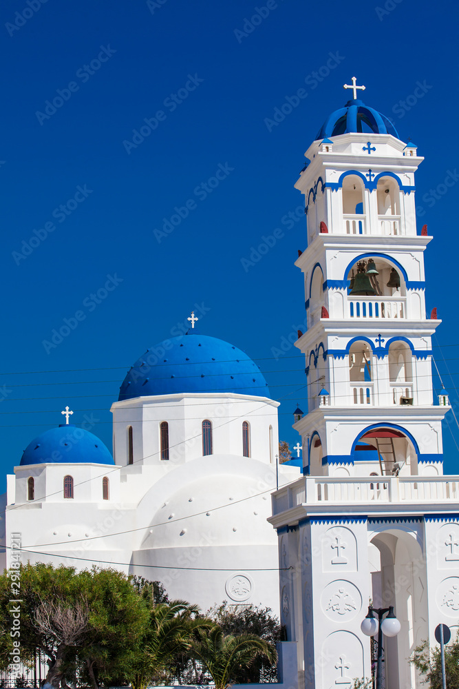 The Church of Holy Cross in the central square of Perissa on Santorini Island