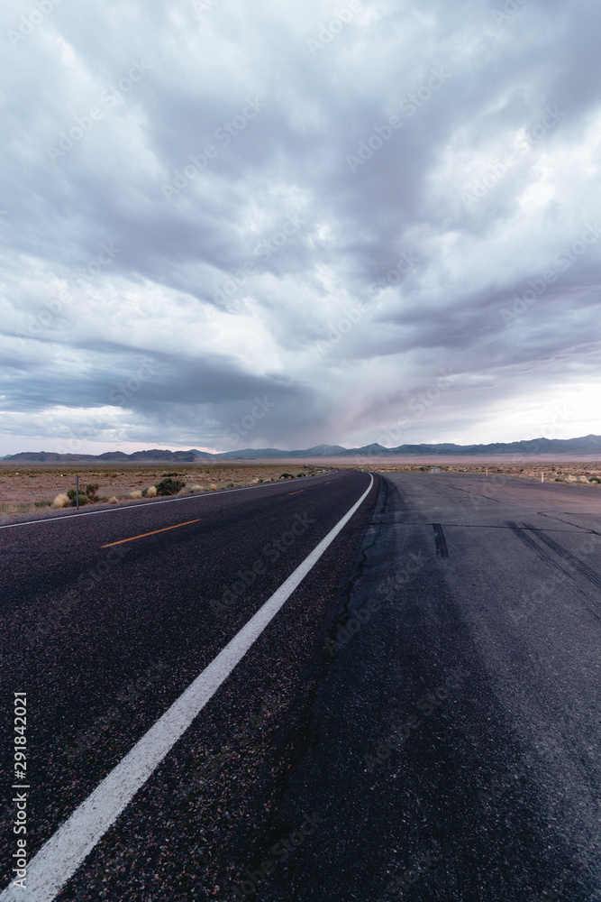 Nevada highway into desert at dusk