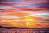 Seascape. Clouds, red sunrise sky, Mossel bay. South Africa.