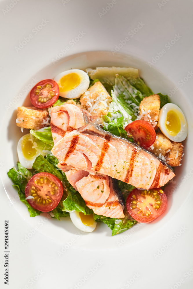 Tasty caesar with salmon top view Tasty caesar with salmon top view