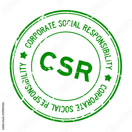 Grunge green CSR Corporate social responsibility word round rubber seal stamp on white background