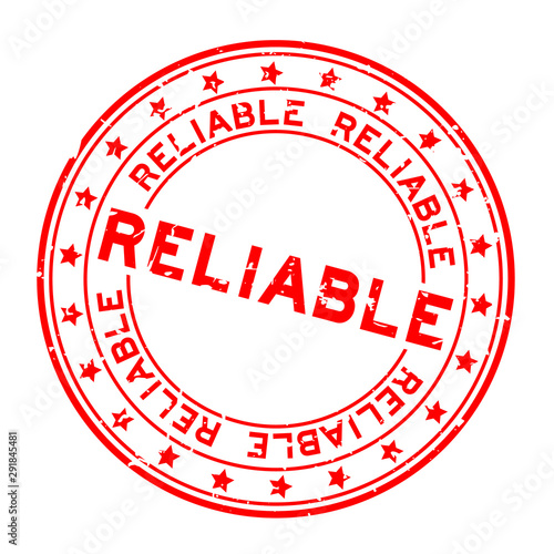 Grunge red reliable word round rubber seal stamp on white background
