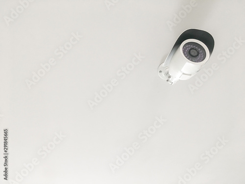 CCTV on the white ceiling and copy space