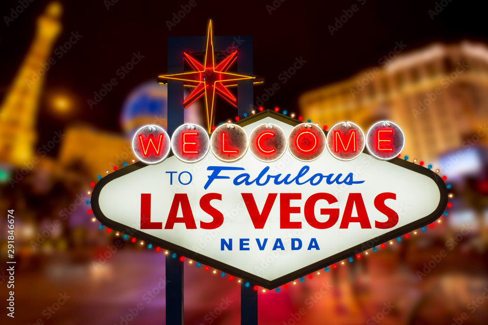 Welcome to fabulous Las Vegas neon sign with Las Vegas strip road background Welcome to fabulous Las Vegas neon sign with Las Vegas strip road background