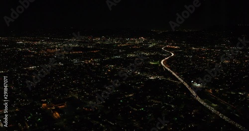 Aerial shot, night, slow lead-in to popular west hollywood buildings, drone