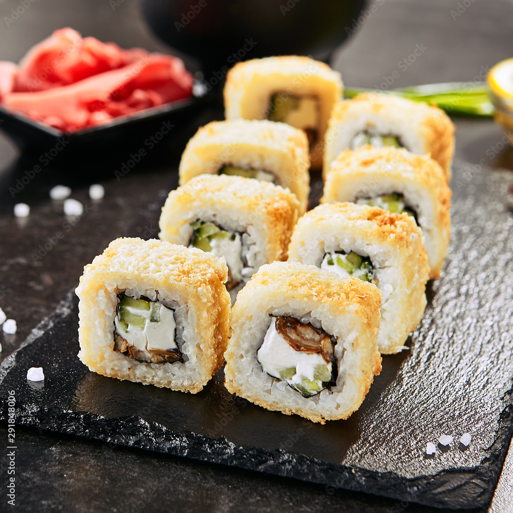 Premium Photo  Japanese food sushi rolls with eel and cream cheese topped  with unagi sauce