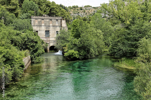 Old water power plant building on the Jadro river photo