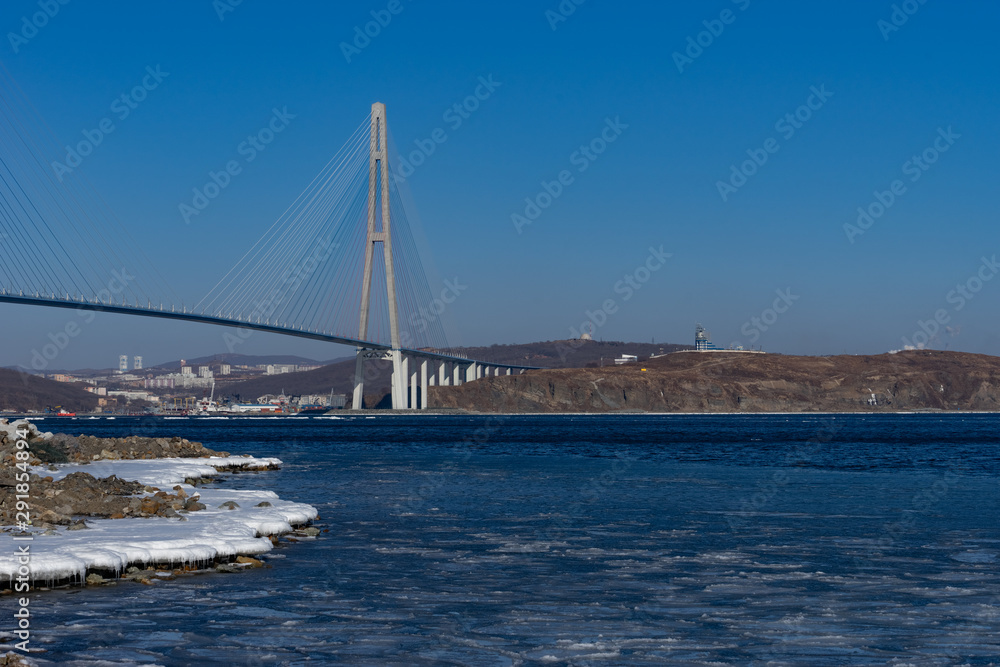 Russian bridge against the blue sky.