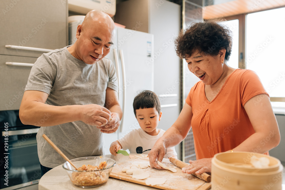 Grandparents cooking with grandson Grandparents cooking with grandson