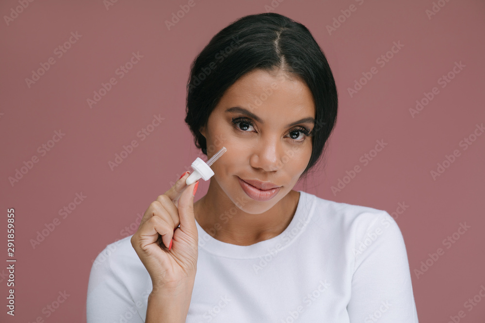 Woman Applying Serum Woman Applying Serum