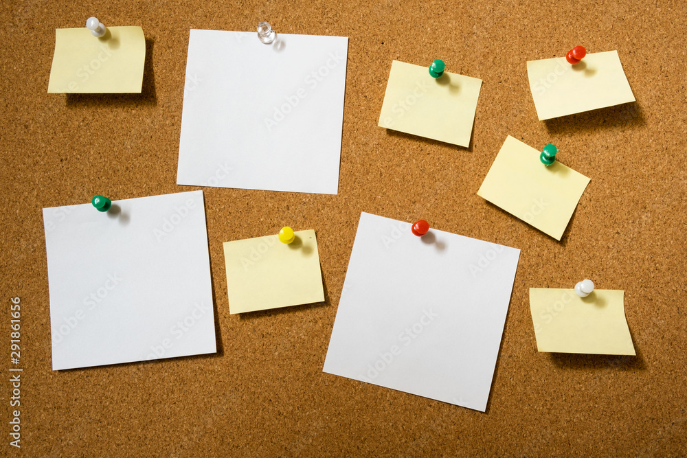 Note paper sheets pinned to a cork board with push pins. Office style  design. Stock Photo | Adobe Stock