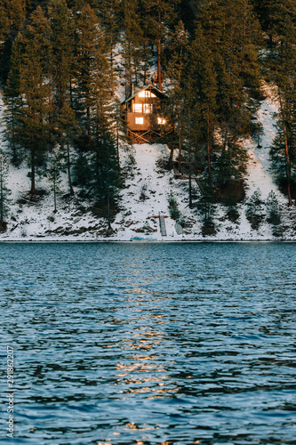 Window Reflection on Lake Cabin photo