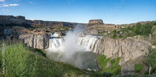 Shoshone Falls Park on bright  sunny summer day with mist and rainbow over waterfall  Twin Falls  Idaho  USA