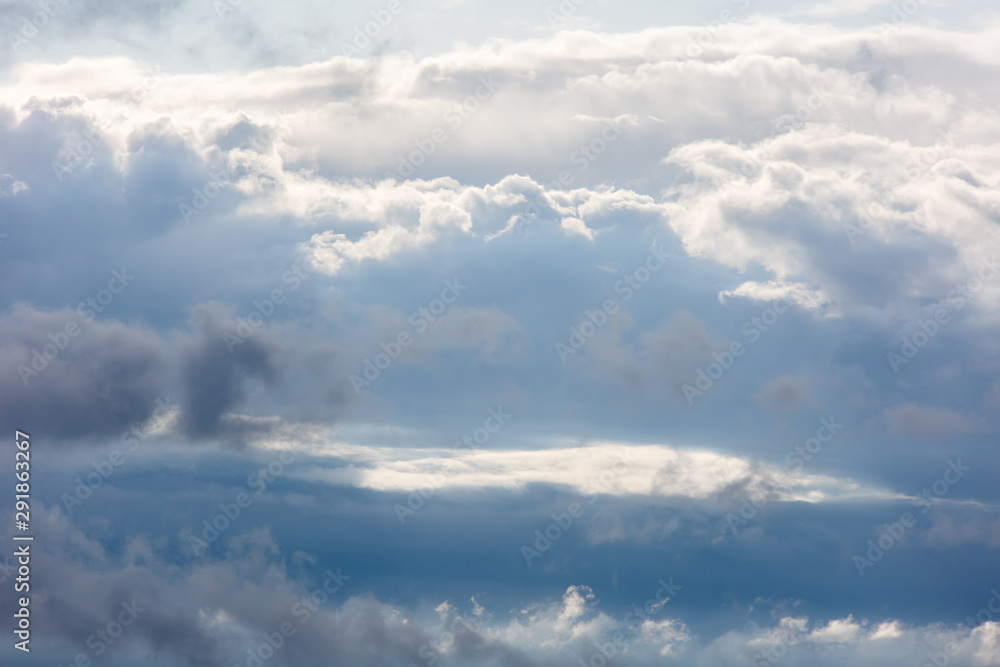 Thick beautiful clouds and clouds in the sky. Cloudy weather before the storm and rain.