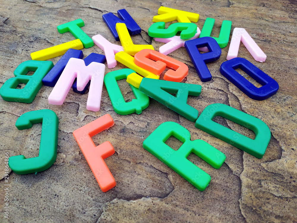 plastic alphabet letters isolated on white background plastic alphabet letters isolated on white background