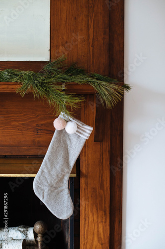 christmas stockings on fireplace mantle photo