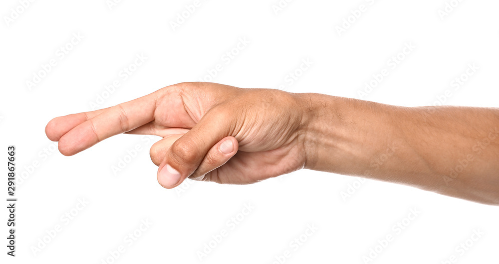 Male hand with crossed fingers on white background Male hand with crossed fingers on white background