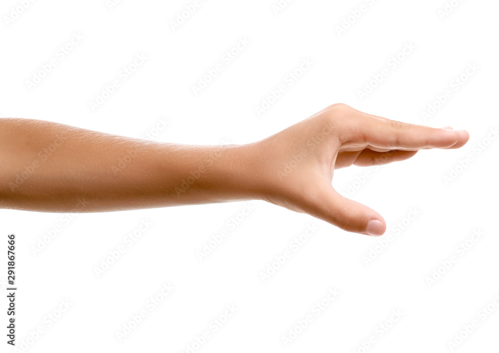 Child's hand holding something on white background Child's hand holding something on white background