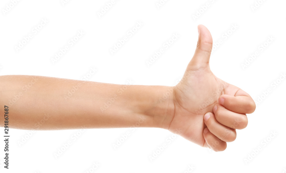 Child's hand showing thumb-up on white background