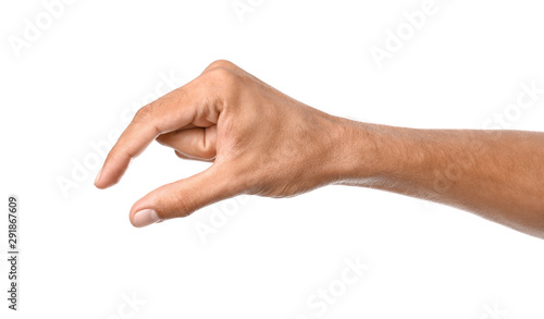 Male hand holding something on white background