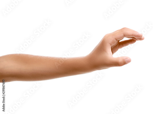Fotografie Child's hand holding something on white background