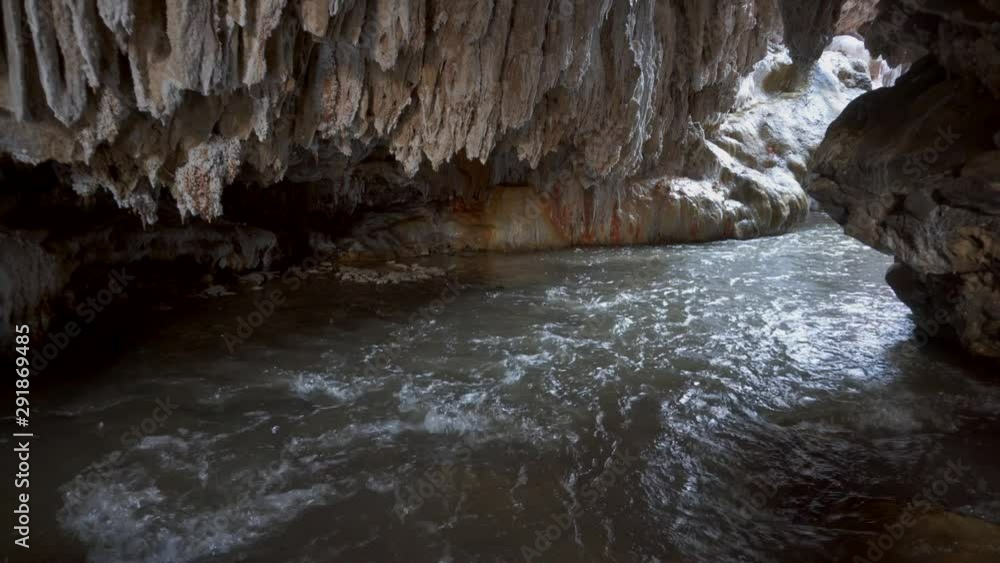 River flowing inside spectacular Puente del Diablo cave in Salta, Argentina River flowing inside spectacular Puente del Diablo cave in Salta, Argentina