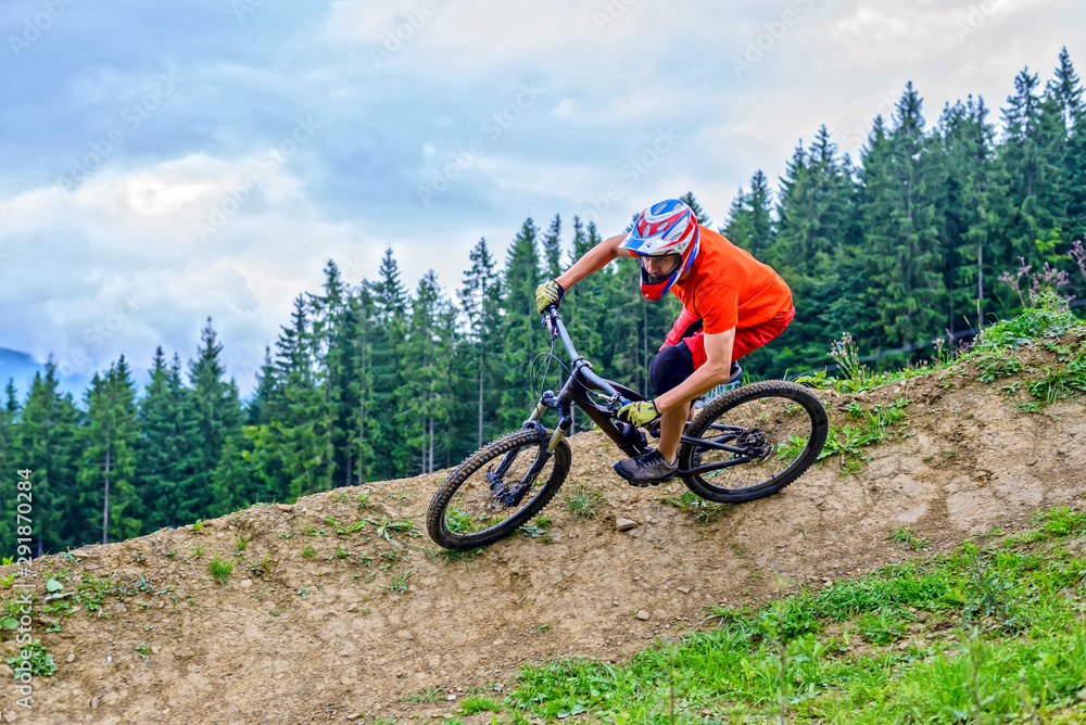 Cyclist riding a mountain bike from a mountain. Cyclist riding a mountain bike from a mountain.