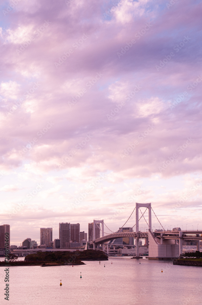 Odaiba Rainbow bridge with Tokyo bay view at evening sunset sky