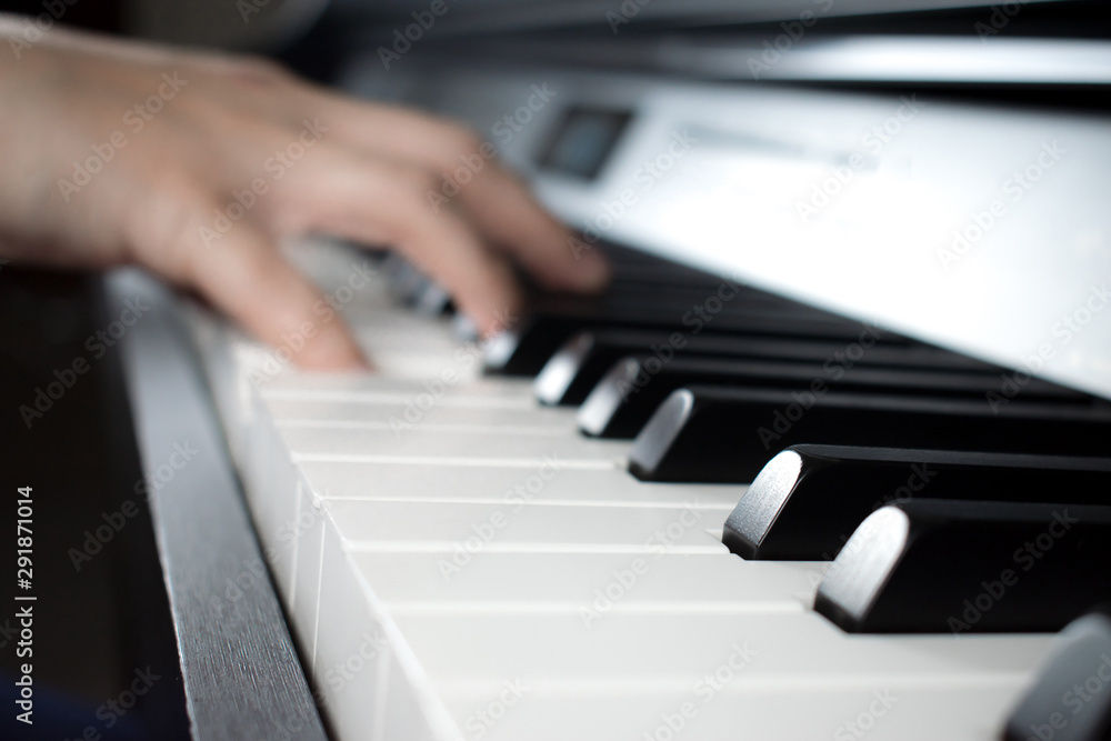Blurred pictures of hands playing the piano. Blurred pictures of hands playing the piano.