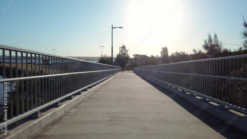 An overpass walkway bridge over the highway An overpass walkway bridge over the highway